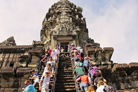 Hundreds of thousands of international tourists visit Angkor Wat every year.